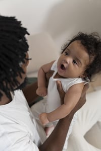 parent-spending-time-with-baby-min